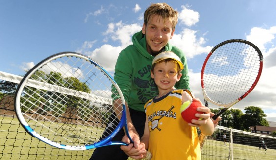 Simon, one of the Windsor coaches with a junior member